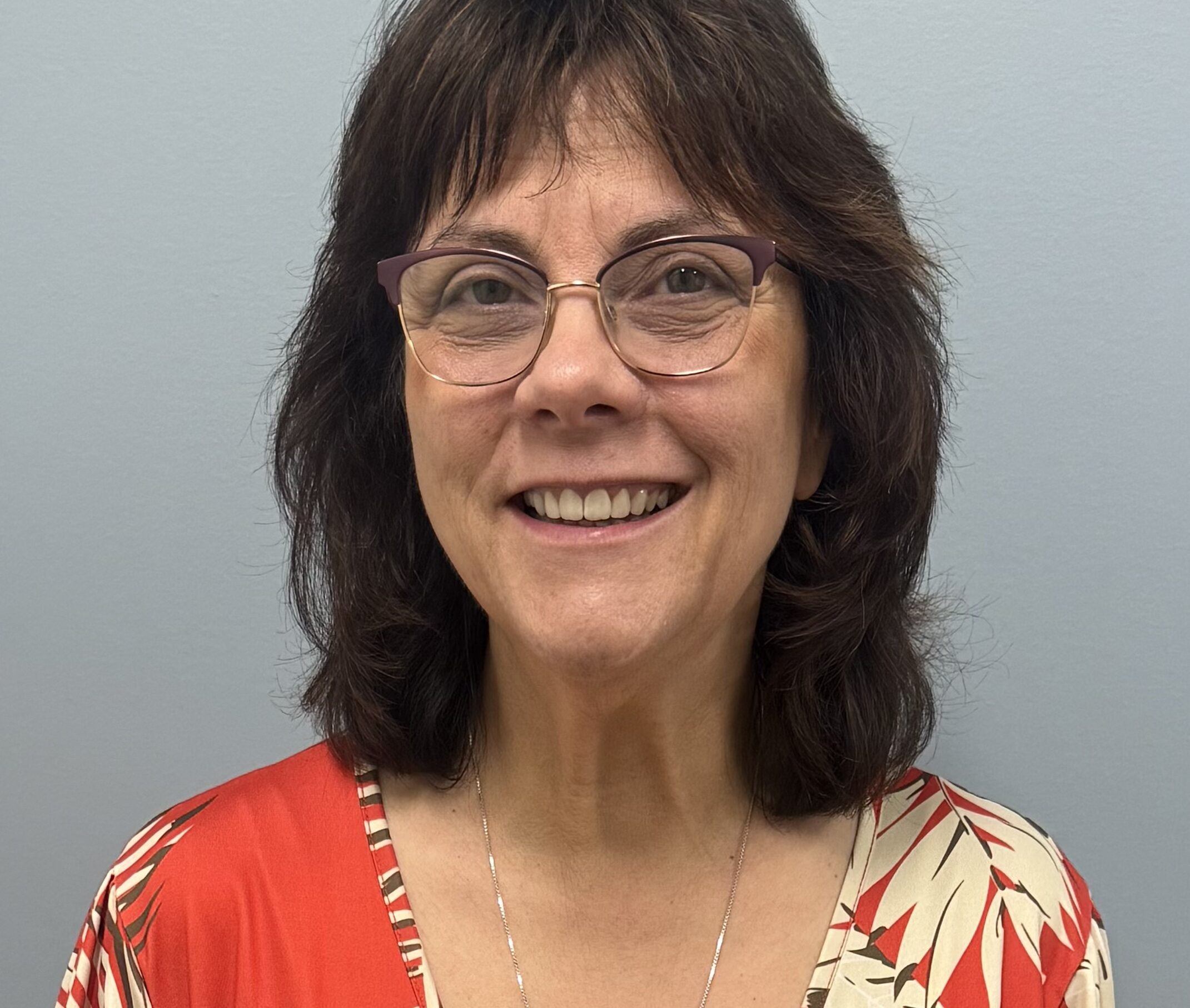 Patient after results from the medical weight loss and aesthetics treatment program at Michigan Weight Loss Institute."