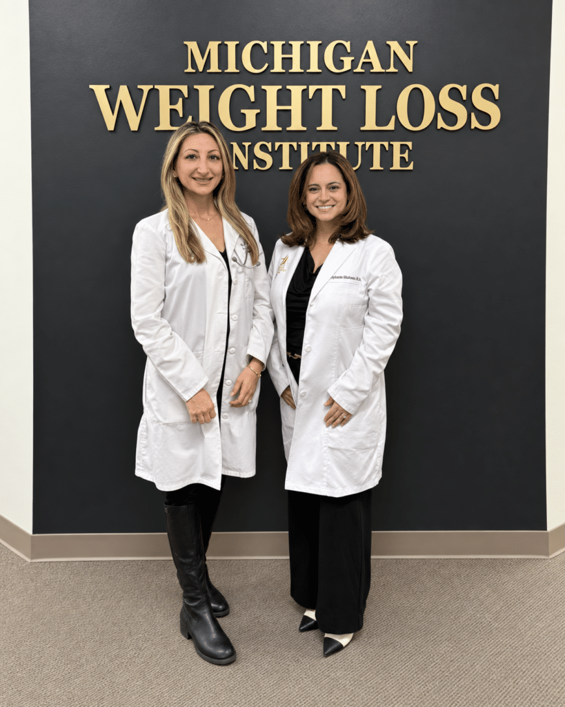 Dr. Rita Kathawa and Stephanie Shaheen, PA-C, standing together at Michigan Weight Loss Institute.